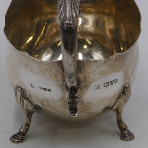 271 - A Chester silver round sauce boat with crinkled rim, scrolled handle and splayed hoof feet 6.2oz