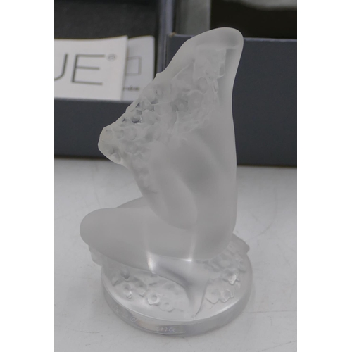 105 - A frosted glass small Lalique figure of a kneeling female nude playing with her hair, 8cm high, sign... 