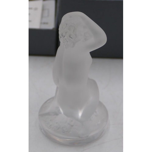 105 - A frosted glass small Lalique figure of a kneeling female nude playing with her hair, 8cm high, sign... 