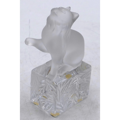 106 - A Lalique frosted glass figure of a seated cat on plinth, 15cm high, signed.