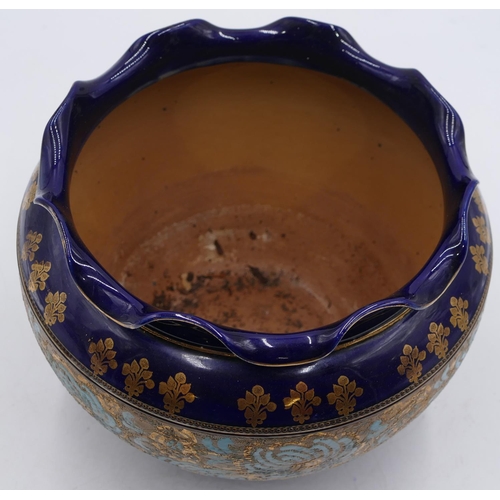 11 - A Royal Doulton glazed stoneware round bulbous thin necked jardinière with crinkled rim on blue and ... 