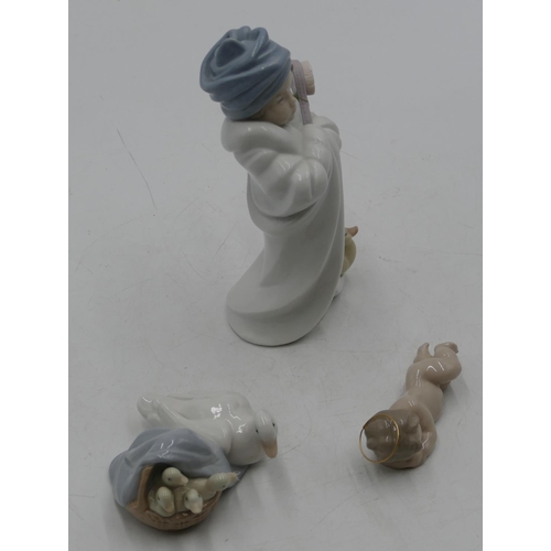 111 - A Lladro group of duck with ducklings, 10cm wide, a small Lladro figure of a sleeping child and a Ll... 