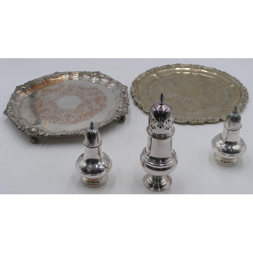 154 - A silver-plated card tray with shell and gadrooned rim and etched centre.  29cm diameter, a similar ... 