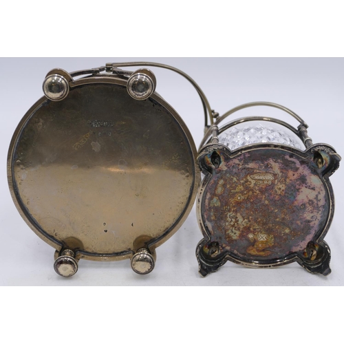 155 - A silver-plated and cut glass round bulbous shaped biscuit barrel with cover, a matching plated fram... 