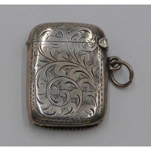 175 - A small Birmingham silver Vesta case with chased decoration and hinged lid, 3.8 cm high.