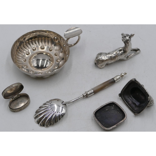 180 - A heavy silver-plated model of a deer, 8cm long, a silver-plated wine taster with embossed ball deco... 