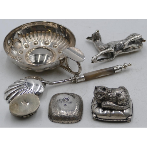 180 - A heavy silver-plated model of a deer, 8cm long, a silver-plated wine taster with embossed ball deco... 