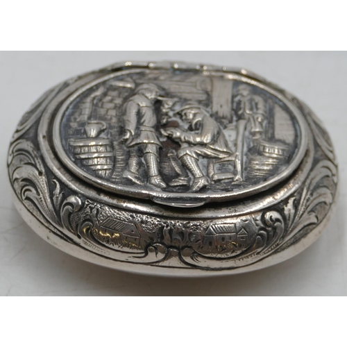 184 - A Continental 800 silver-coloured metal bulbous shaped snuff box with hinged lid, allover embossed f... 