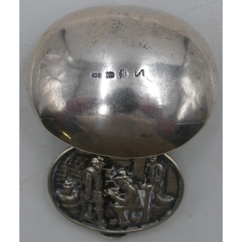 184 - A Continental 800 silver-coloured metal bulbous shaped snuff box with hinged lid, allover embossed f... 