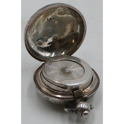 188 - A Chester silver round bulbous shaped sovereign case with hinged top and allover etched scroll decor... 