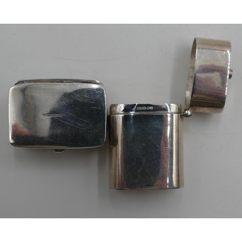 192 - A modern London plain oblong silver pill box with hinged lid, sliding release to top, 3.8cm high and... 