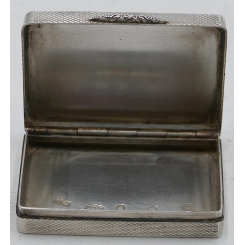 199 - A modern London silver rectangular shaped snuff box with allover engine turn decoration and hinged l... 