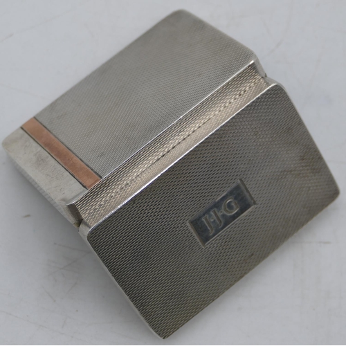 199 - A modern London silver rectangular shaped snuff box with allover engine turn decoration and hinged l... 