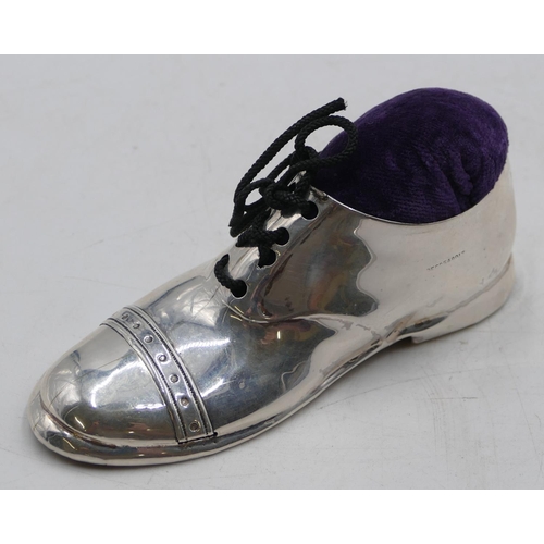 201 - A George V silver large novelty pin cushion in form of a shoe, Chester 1923 (makers mark rubbed), 12... 