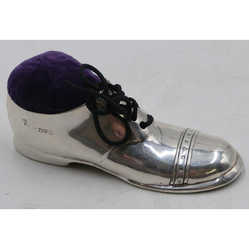 201 - A George V silver large novelty pin cushion in form of a shoe, Chester 1923 (makers mark rubbed), 12... 