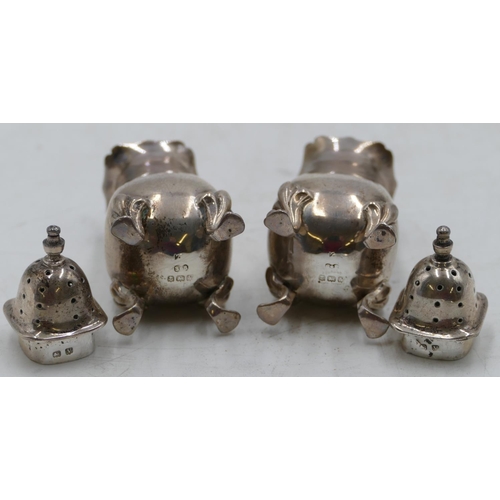 214 - A pair of Birmingham square silver bulbous shaped pepper pots on splayed feet, 2.3oz.