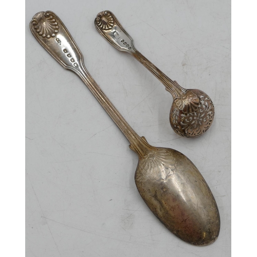 217 - A Victorian silver sifter spoon, London 1877 and a silver table spoon, London 1841, 4.2oz. (2)