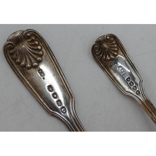 217 - A Victorian silver sifter spoon, London 1877 and a silver table spoon, London 1841, 4.2oz. (2)