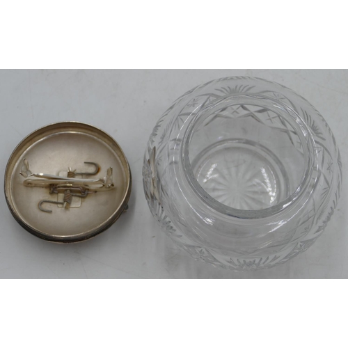 219 - A cut glass round bulbous shaped sugar bowl with Birmingham silver top and mounted with mechanical t... 