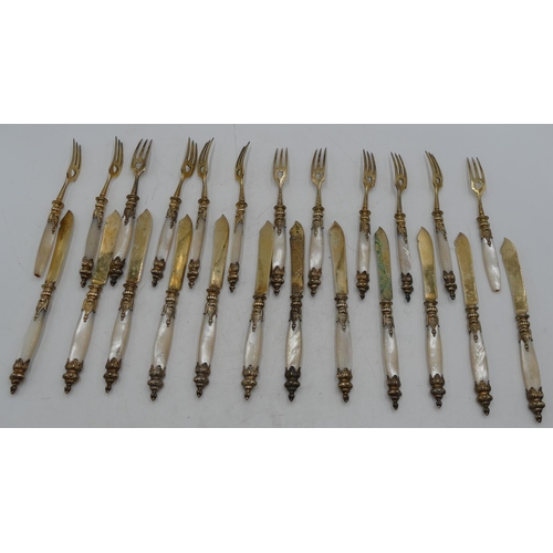 233 - A set of 12 800 silver gilt coloured metal fish knives  with Mother of Pearl handles and 12 matching... 