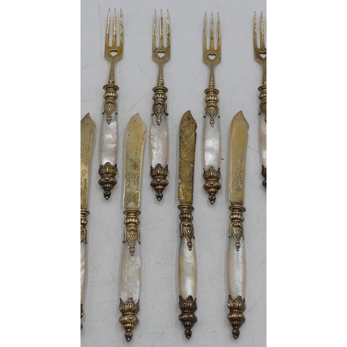 233 - A set of 12 800 silver gilt coloured metal fish knives  with Mother of Pearl handles and 12 matching... 