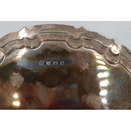 237 - A George V silver pie crust card tray on 3 scroll feet, Sheffield 1923, maker William Hutton & Co Lt... 