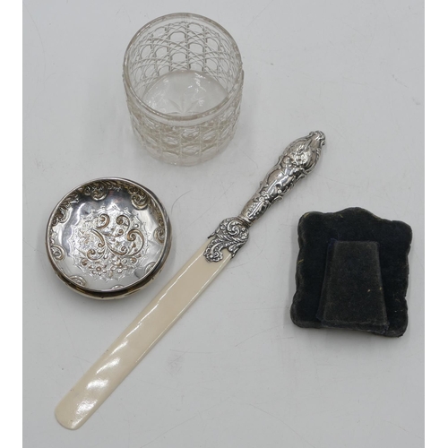 244 - A Chester silver handled paper knife with embossed cupid, floral and scroll decoration with plastic ... 