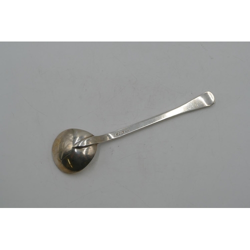 254 - A modern silver serving spoon with raised ball motifs to handle, London 1968, makers mark HDC, 3.6oz... 