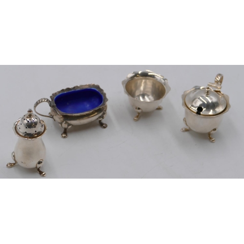 267 - A 3-piece London silver round scallop shaped condiment set on splayed feet and a silver rectangular ... 