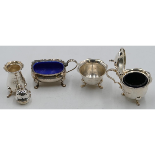 267 - A 3-piece London silver round scallop shaped condiment set on splayed feet and a silver rectangular ... 