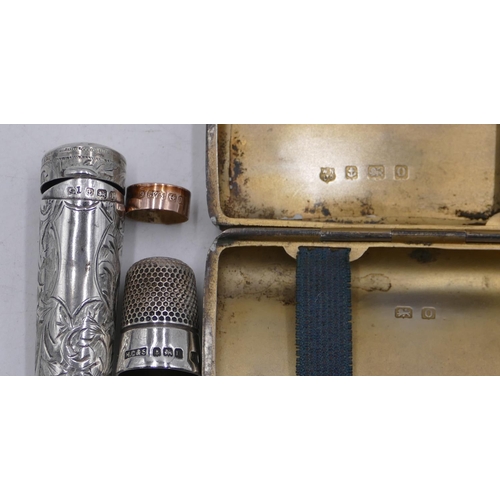 280 - A Birmingham silver cheroot holder with engraved decoration, hinged lid enclosing amber mouthpiece w... 