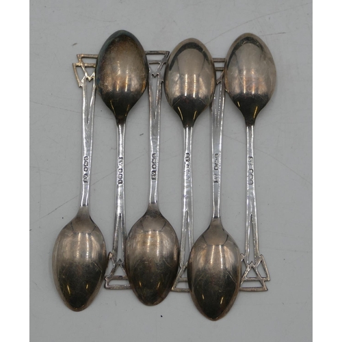 286 - A set of 6 Sheffield silver teaspoons with pierced finials, in fitted blue leather case, 1.6oz.