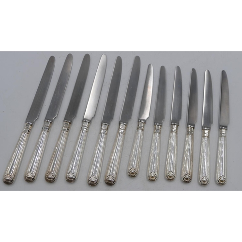 292 - A set of 6 modern London silver handled dinner knives and 6 matching dessert knives. (12)