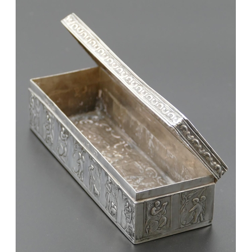 295 - A Dutch silver-coloured metal rectangular shaped box with hinged lid and allover embossed figure, cu... 