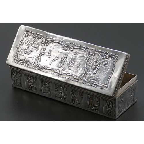 295 - A Dutch silver-coloured metal rectangular shaped box with hinged lid and allover embossed figure, cu... 