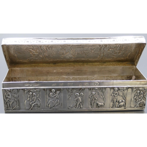 295 - A Dutch silver-coloured metal rectangular shaped box with hinged lid and allover embossed figure, cu... 