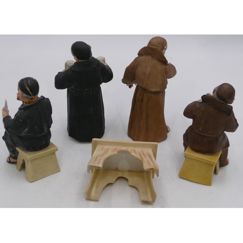 3 - 4 Continental china figures of 4 monks standing and seated around a table (1 seated monk badly a/f a... 