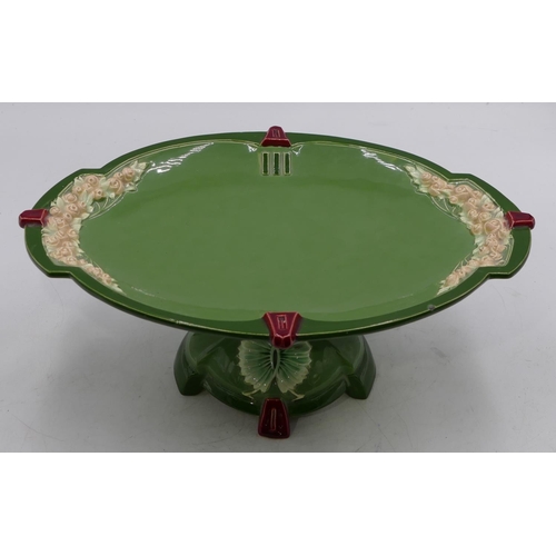 30 - An Eichwald oval scallop shaped comport with raised floral and leaf decoration on sweeping base, 35.... 