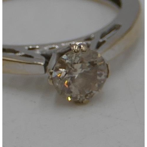 301 - An 18ct white gold solitaire diamond ring, approx. 0.60ct, size K/L.