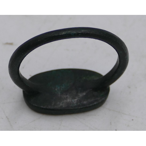 305 - A Roman style ring with engraved top