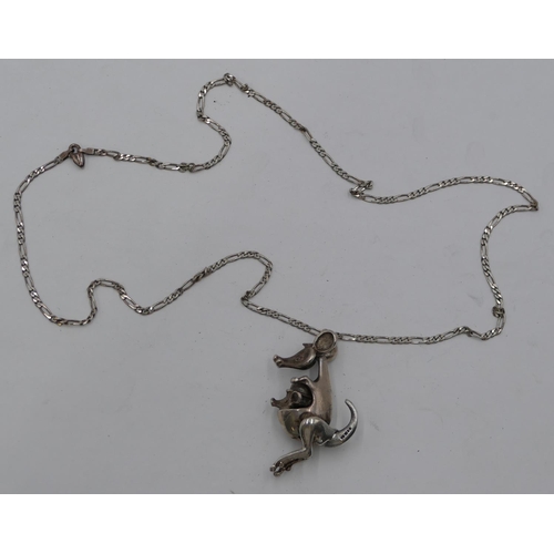 320 - A silver pendant in form of a kangaroo with its young, mounted on chain (chain clip a/f), 25.5 grams... 