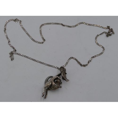 320 - A silver pendant in form of a kangaroo with its young, mounted on chain (chain clip a/f), 25.5 grams... 