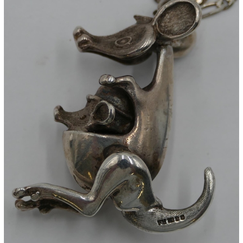 320 - A silver pendant in form of a kangaroo with its young, mounted on chain (chain clip a/f), 25.5 grams... 