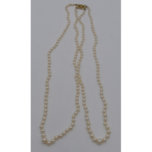 322 - A double row graduated cultured pearl necklace with 9ct gold clasp, 48 cm long.