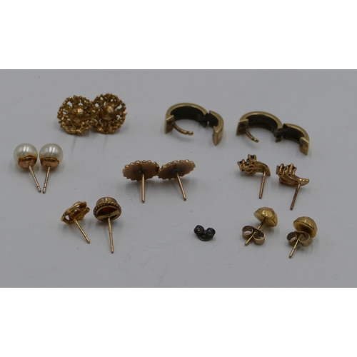 324 - A pair of gold hinged earrings, 2 other pairs of gold earrings, 6.2 grams and 3 other pairs of earri... 