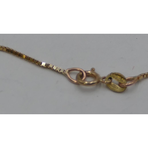 328 - A 9ct gold small square linked chain, 45cm long, 1.5 grams.