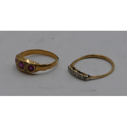 340 - An 18ct gold ladies' ring set with 3 rubies and interspersed by small diamond chips (cut), size L/M ... 