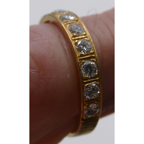 345 - An 18ct gold half eternity ring set with 7 diamonds, size O, 2.7 grams gross.