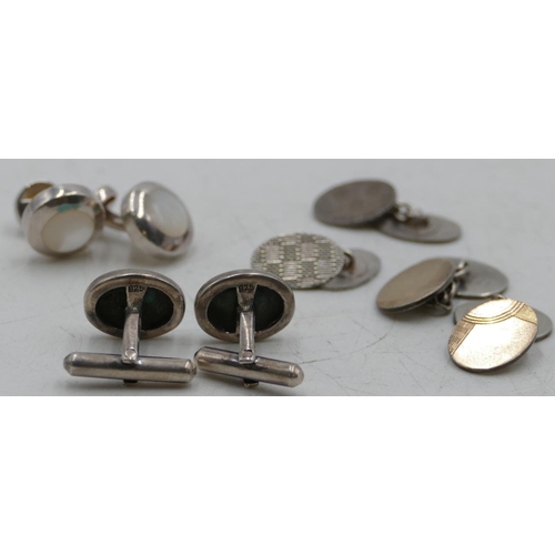 352 - 4 pairs of gentleman's silver cufflinks, 38.2 grams gross.