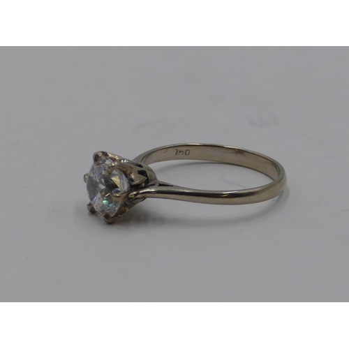 376 - An 18ct white gold moissanite solitaire ring, size N, 2.8 grams gross.